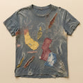 Slate t-shirt repaired by hand with mismatched patches and visible sashiko stitching — flat lay